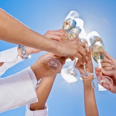 People toasting champagne flutes